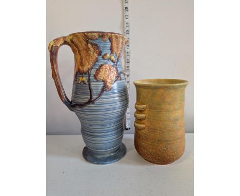 A large Carltonware jug H31cm and a Crown Devon vase, shipping unavailable