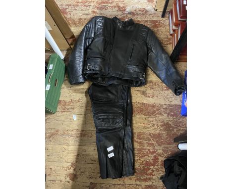 A Akito leather motorbike jacket size 42 and a pair of Belstaff motorbike trousers size 16 