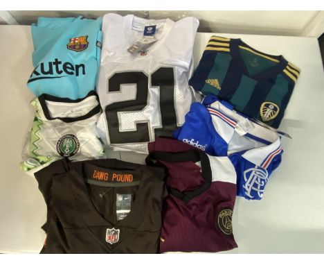 A selection of assorted sports and football shirts including Leeds United (unauthenticated) 