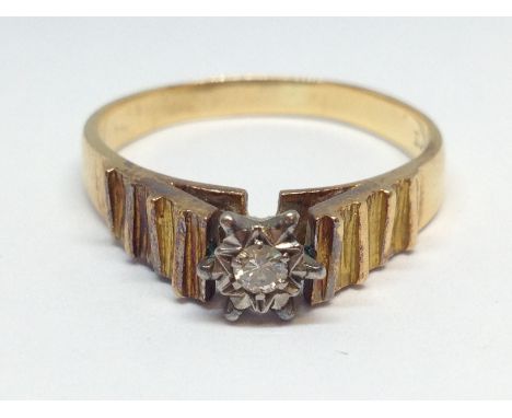A diamond ring, marke '18ct', gross wt. 3.9g, size Q. 