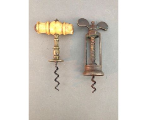 A 19th century brass Farrow &amp; Jackson style corkscrew, heavy brass twin pillar mechanical corkscrew together with a 19th 