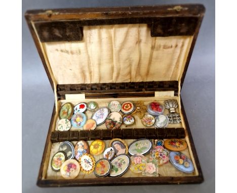 A box of vintage brooches to include dry flowers, tapestry examples, various settings, etc. 