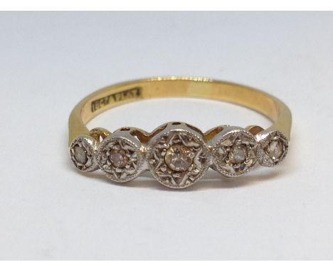 An antique illusion set five stone diamond ring, marked '18ct&amp;PLAT', gross wt. 2g, size L. 