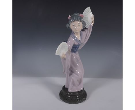 A Lladro porcelain figurine titled Madame Butterfly, model number 01004991, depicting a graceful geisha in a traditional lave
