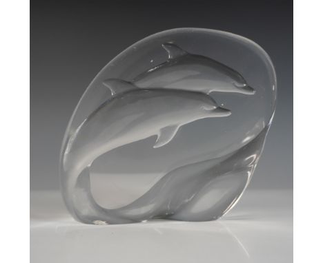 Exquisite Mats Jonasson crystal sculpture featuring two gracefully sculpted dolphins leaping through the waves. Crafted in Sw