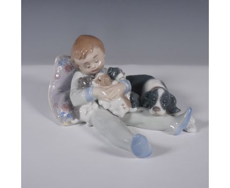 A heartwarming Lladro porcelain figurine, model 1535, titled "Sweet Dreams", designed by Antonio Ramos. This charming piece d