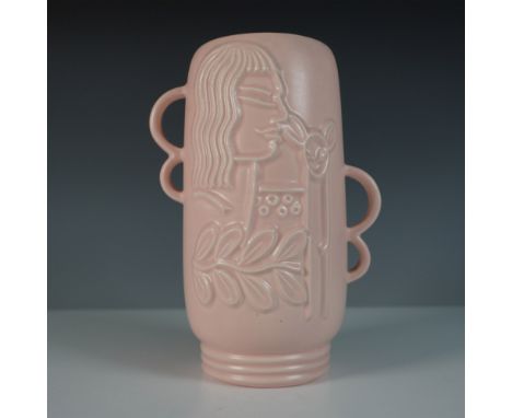 A Red Wing Pottery vase, model 1151, featuring an elegant matte pink glaze. This Art Deco-inspired piece is adorned with a ra