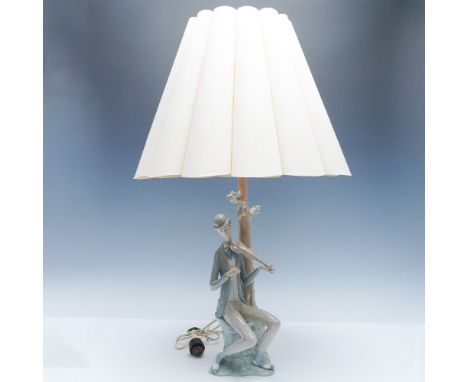 Lladro porcelain table lamp featuring the Boy with Violin figurine (#1004634). This elegant piece depicts a young violinist i