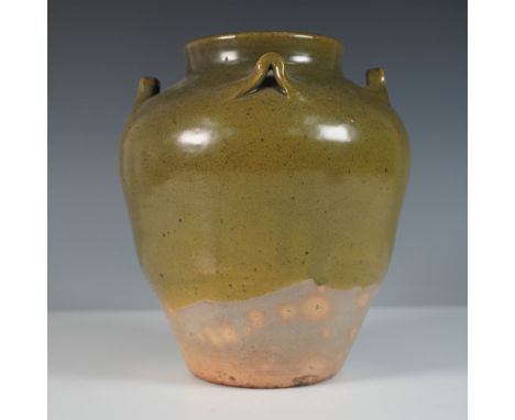A finely crafted Jugtown Pottery stoneware urn in a traditional Chinese-inspired form, featuring an elegant ovoid shape with 