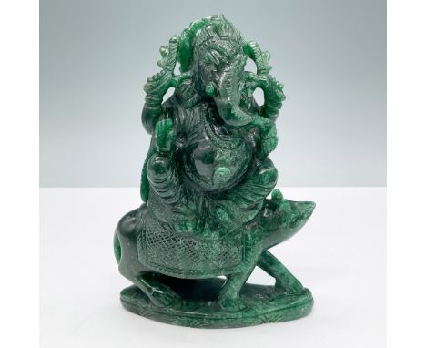 Intricately carved green stone figurine of Lord Ganesh, seated on a mouse, a traditional symbol of his vahana (vehicle). The 