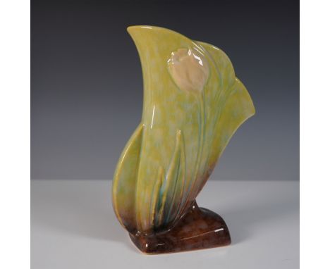 A vintage Roseville Pottery Wincraft vase, model 282-8, featuring a gracefully curved form with raised floral and leaf motifs