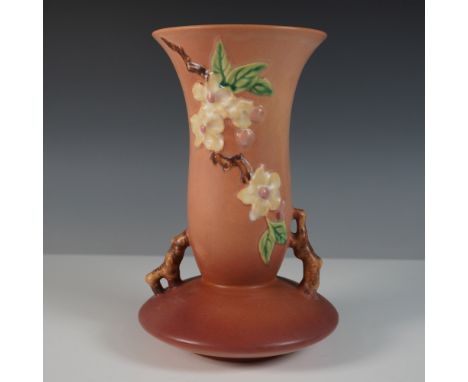 Exquisite Roseville Pottery vase in the Apple Blossom pattern, displaying a warm matte glaze with soft brown tones and delica