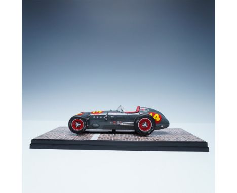 This 1:18 scale diecast model by Carousel 1 replicates the iconic Kurtis Kraft Roadster, the 1953 Indianapolis 500 winner dri