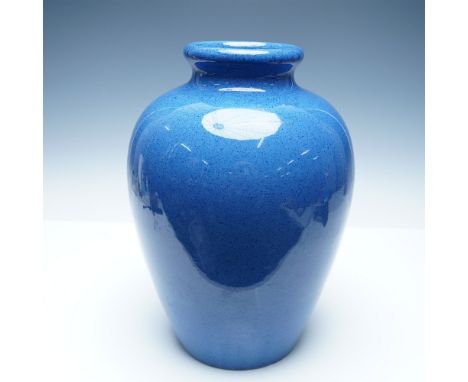 A Moorcroft pottery vase featuring a striking speckled blue glaze. This large vase is crafted in a classic bulbous form, gent