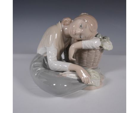 A serene and beautifully crafted Lladro porcelain figurine, model 01001087, titled "Green Grocer", designed by Antonio Balles