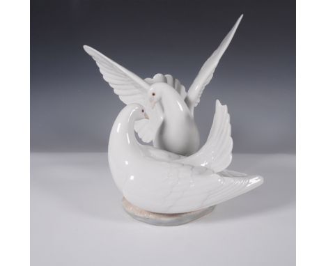 Lladro porcelain figurine titled Love Nest, model number 01006291. This exquisite sculpture depicts two doves in an affection