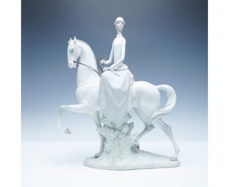 Nao by Lladro matter porcelain figurine featuring an elegant female equestrian riding side-saddle on a gracefully posed horse