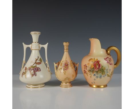 A distinguished trio of Royal Worcester blush ivory colored porcelain, consisting of two ewers and one vase, each showcasing 