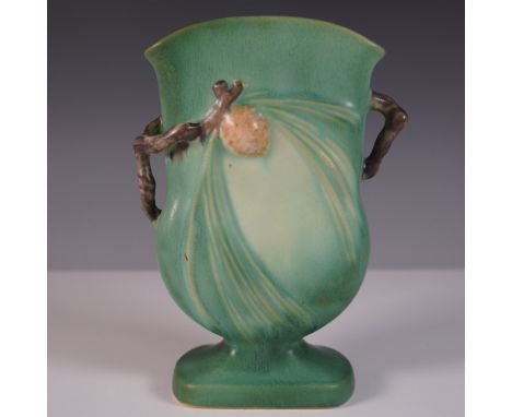A classic Roseville Pottery Pine Cone vase in the sought-after green glaze, featuring a beautifully sculpted pinecone motif w