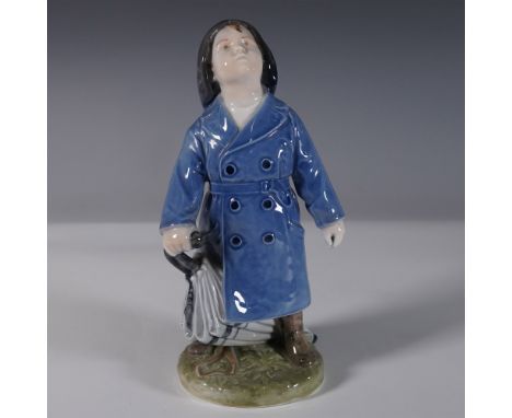 Royal Copenhagen porcelain figurine Girl with Umbrella, style number 3556. This charming hand-painted piece depicts a young g