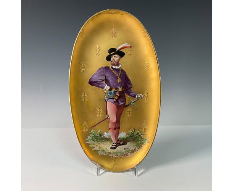 A remarkable antique porcelain oval wall plaque, featuring a masterfully hand painted depiction of a 16th century French gent