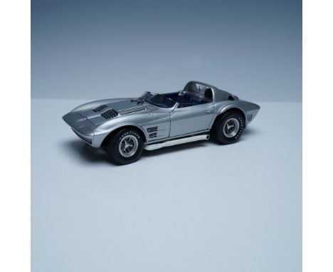This finely detailed 1:18 scale model of the Chevrolet Corvette Grand Sport captures the essence of one of the most legendary