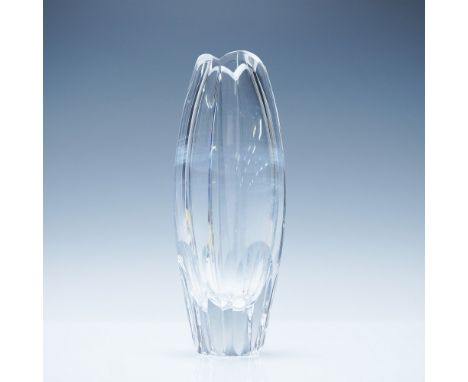 This elegant, handcrafted Stephens crystal vase, signed "Stephens" on the base, features a sculptural fluted design with a ge