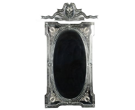 This stunning two-parts Venetian-style wall mirror captures the timeless elegance of traditional hand-crafted glasswork. Feat