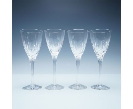 A set of four Stuart Madison Clear Cut wine glasses, showcasing elegant craftsmanship with a refined cut pattern. Each glass 