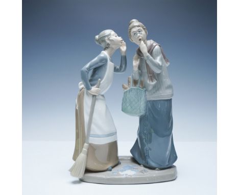 Exquisite Lladro porcelain figurine titled The Gossips. This charming piece portrays two women engaged in an animated convers
