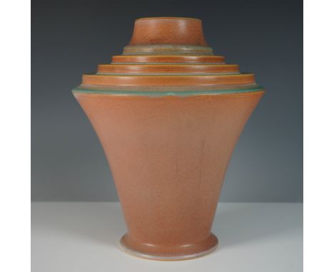 This stunning Roseville Pottery Futura vase features a bold Art Deco design with a striking matte finish and angular, geometr