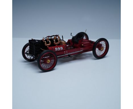 A finely detailed 1:18 scale model of the iconic 1902 Ford 999 race car, known as Henry Ford's most famous early racer. This 