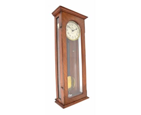 Chronos electric wall clock, the 6.25" silvered dial signed Chronos and with subsidiary seconds dial, within a mahogany glaze