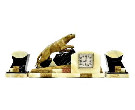 Art Deco coloured marble and onyx figural mantel clock garniture timepiece, the 3.5" square silvered dial inset into a rounde