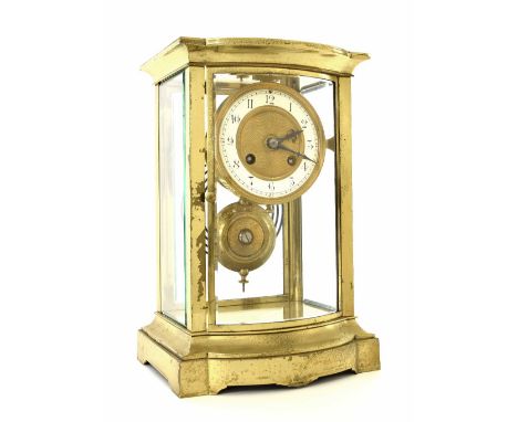 French brass four glass two train mantel clock striking on a gong, the 3.5" white chapter ring enclosing an engine turned gil