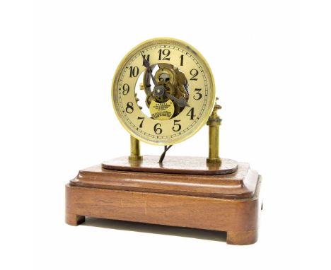 Eureka electric mantel clock, the 4.25" silvered dial enclosing a skeletonised centre inscribed Eureka Clock Co Limited, Lond