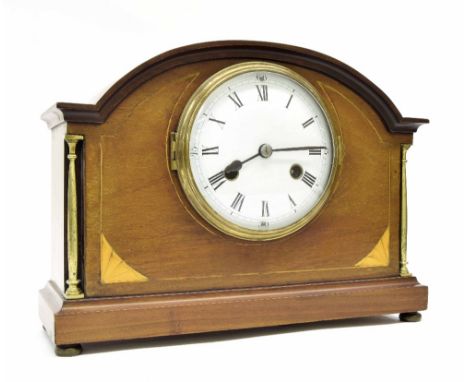 Mahogany inlaid two train mantel clock striking on a gong, the 5.25" white convex dial within a rounded arched stepped case, 