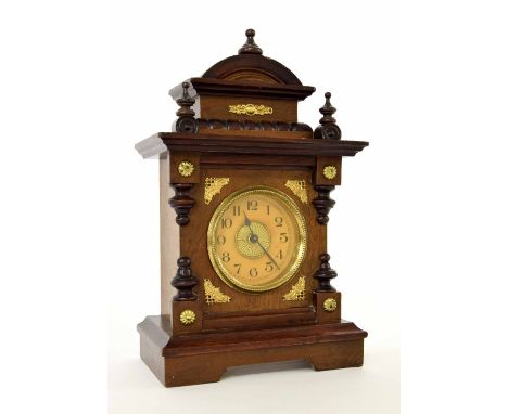 German walnut musical alarm table clock, the movement back plate fitted with an alarm dial over a musical cylinder, the 3.5" 