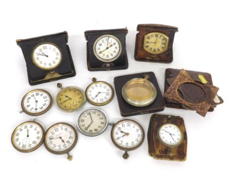 Swiss eight day travel clock within a leather case, signed The Consol, together with a German travel alarm clock within a lea