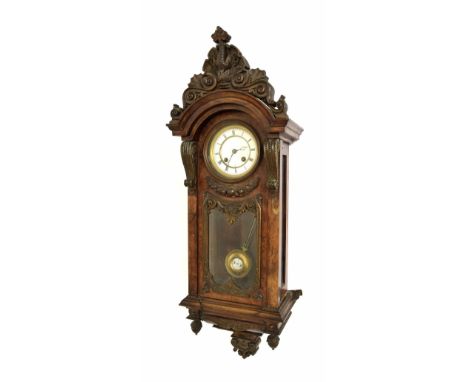 Small figured walnut two train Vienna type regulator wall clock, the 3.25" white dial within an architectural carved case sur