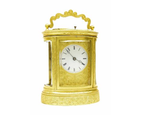 Fine ormolu repeater oval carriage clock striking on a bell, the 2" white dial within a gilt foliate engraved mask, the case 
