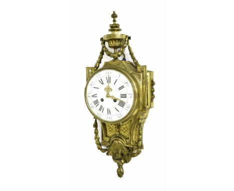 French ormolu cartel two train wall clock, the Vincenti movement striking on a bell, the 6.5" white dial within an ornate cas