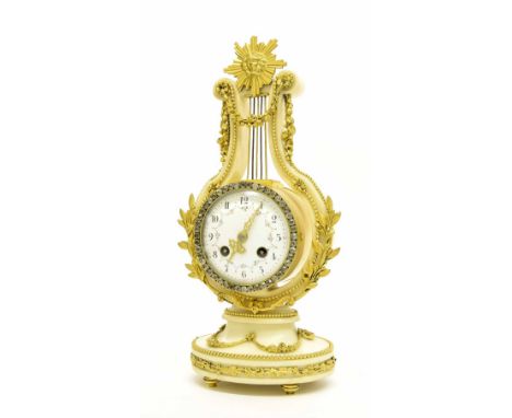 French ormolu and white marble two train lyre mantel clock striking on a bell, the 3.5" convex white floral painted dial with