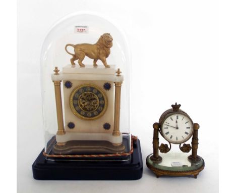 Onyx and gilt metal mounted mantel clock timepiece, the 3.75" chapter ring enclosing a skeletonised centre, within a pillared