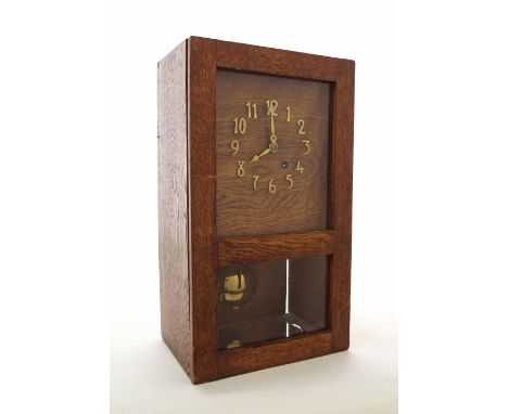 Oak single fusee mantel clock timepiece, the dial with Arabic numerals over a pendulum window, 15.5" high (pendulum and key)