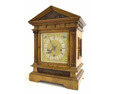 Walnut three train mantel clock, the movement back plate stamped with the maker's trademark floral logo and with the initials