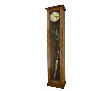 Electric master clock, the 6.5" cream dial within a glazed oak case, 58" high (pendulum)
