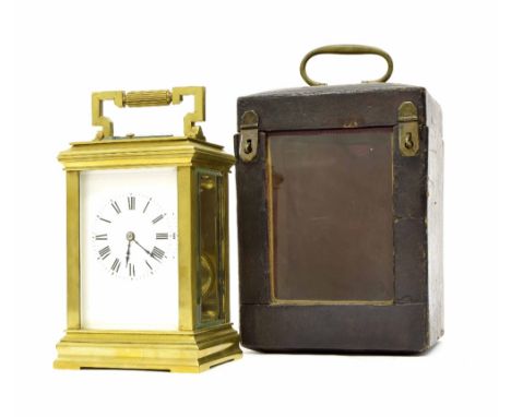 French repeater carriage clock striking on a gong, within a stepped case, 7.25" high; also within a Morocco travelling case