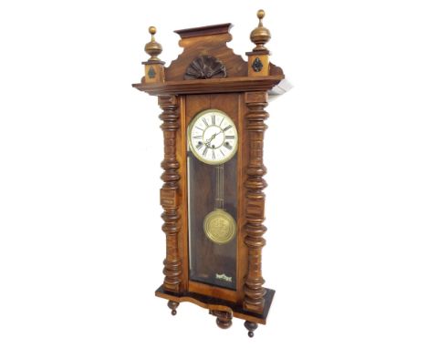 Unusual walnut three train Vienna regulator wall clock chiming on rods, the 7" cream dial within a glazed and turned pillared
