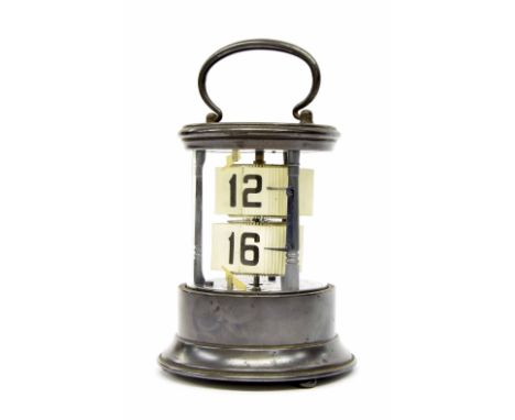 Small cylindrical Ever Ready Chronos ticket clock, within a stepped glazed metal case with carrying handle, 7" high